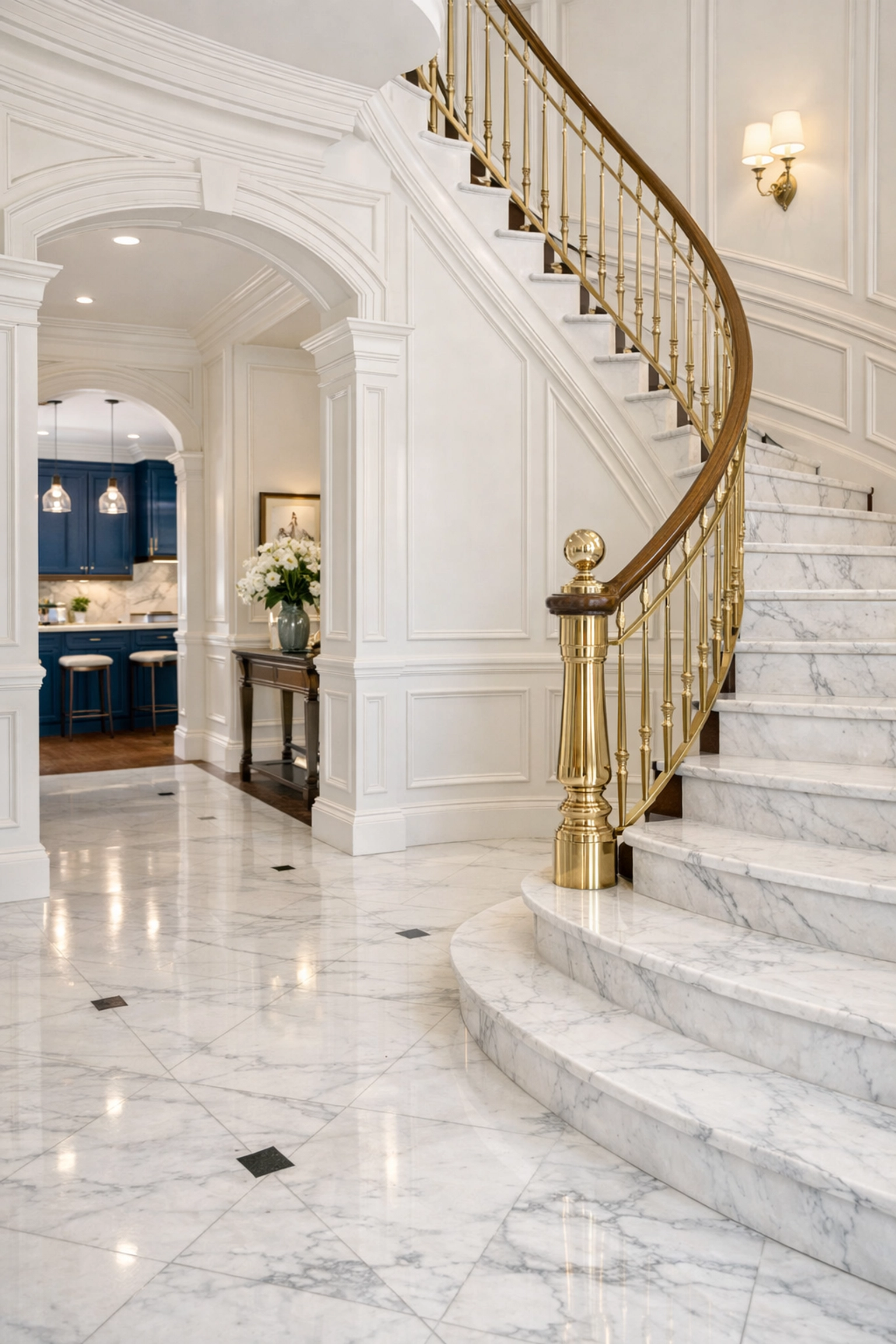 Deep-cleaned grand foyer and marble staircase in a luxury Massachusetts estate with polished finishes.