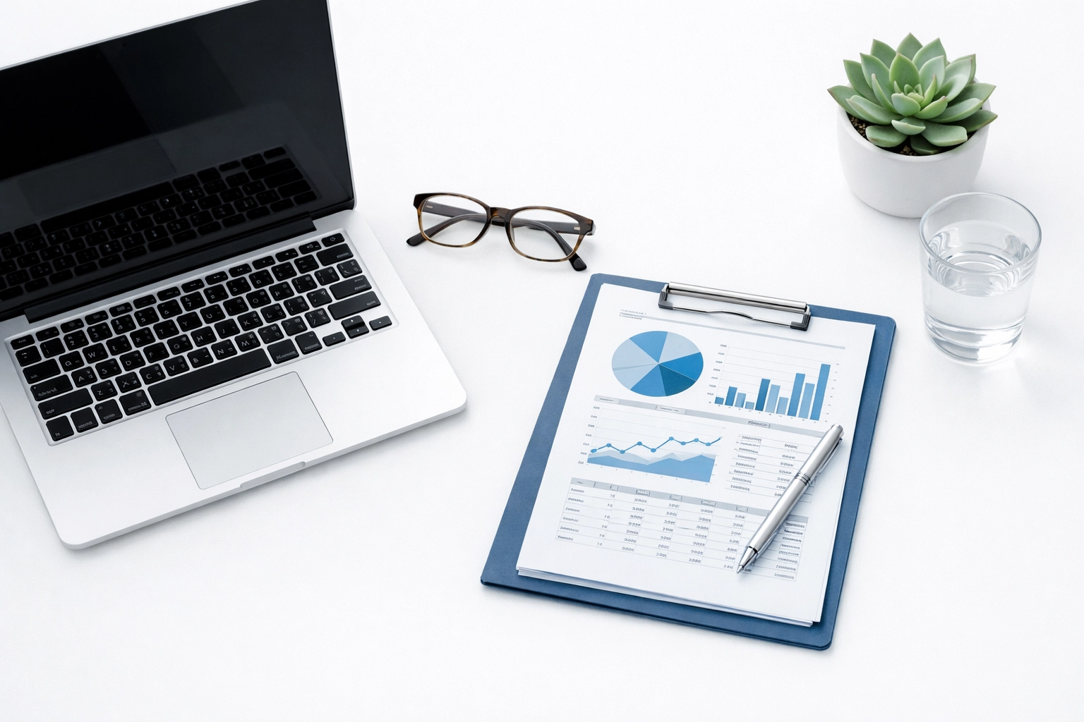 Organized financial reports on a desk, ready for an Alabama business valuation and SBA loan review.