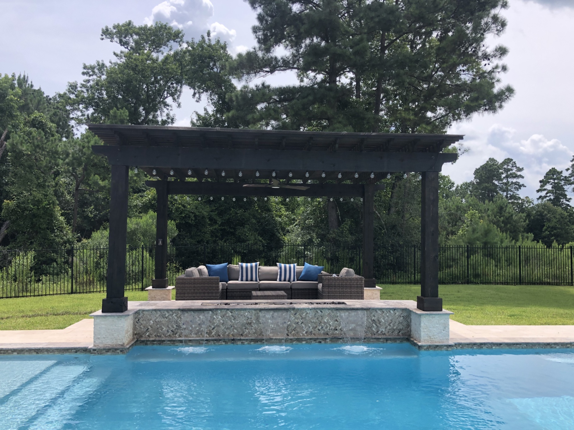 Poolside seating with Ledge Loungers and wicker furniture