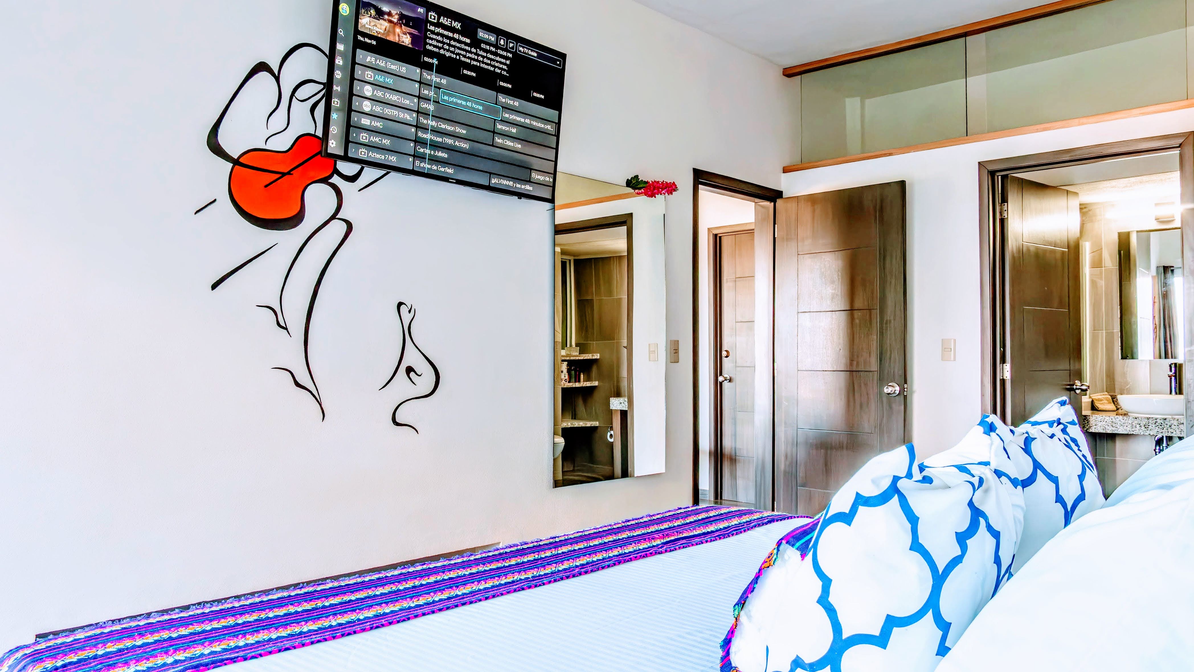 Bright and colorful bedroom with Mexican textiles