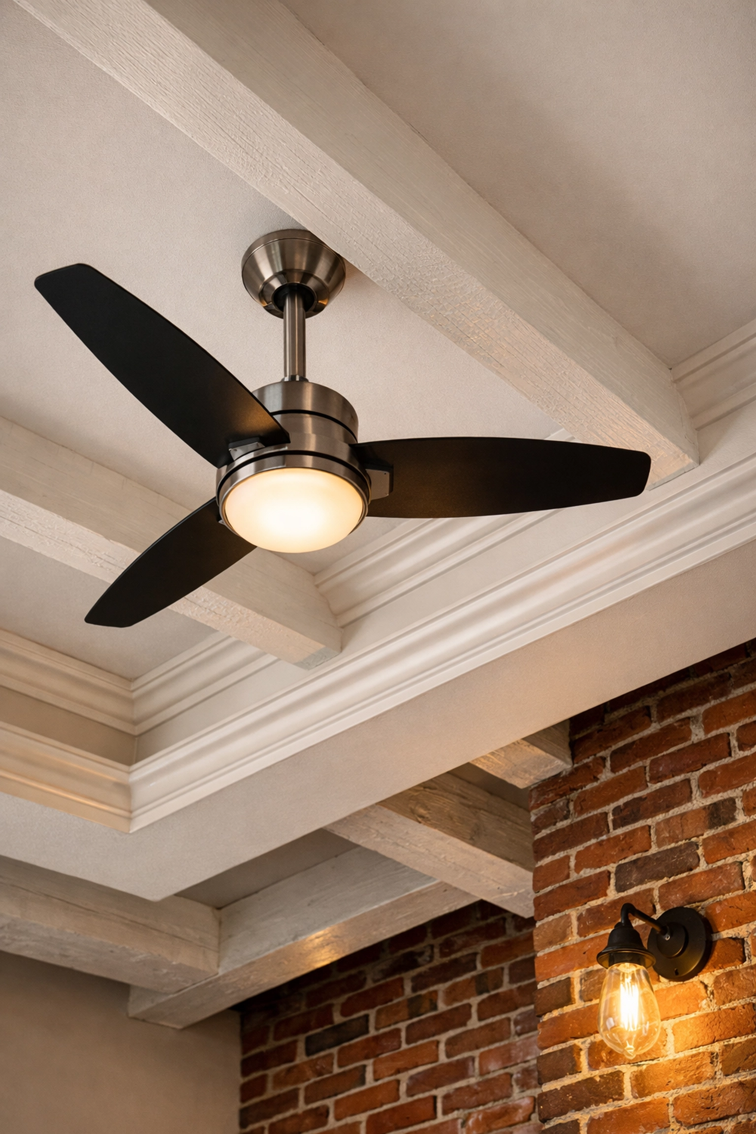 Expert house cleaning Lowell MA addressing dusty ceiling fans in a historic mill conversion home.