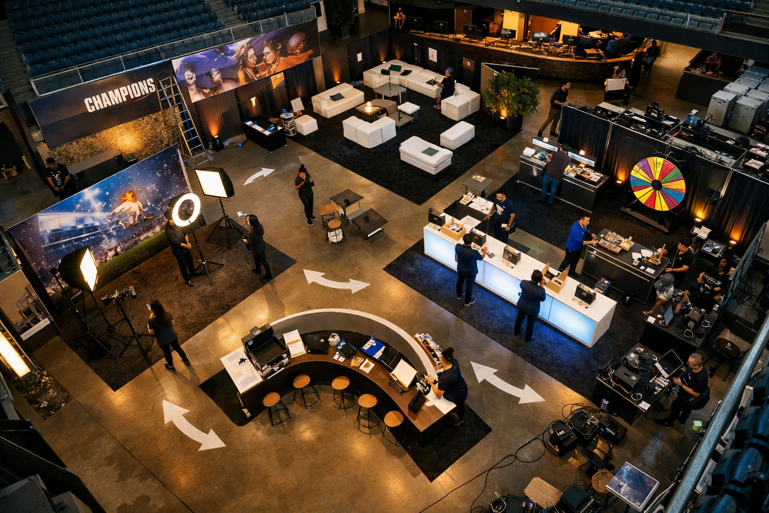 Overhead view of sports venue activation space setup with multiple engagement zones and LED displays