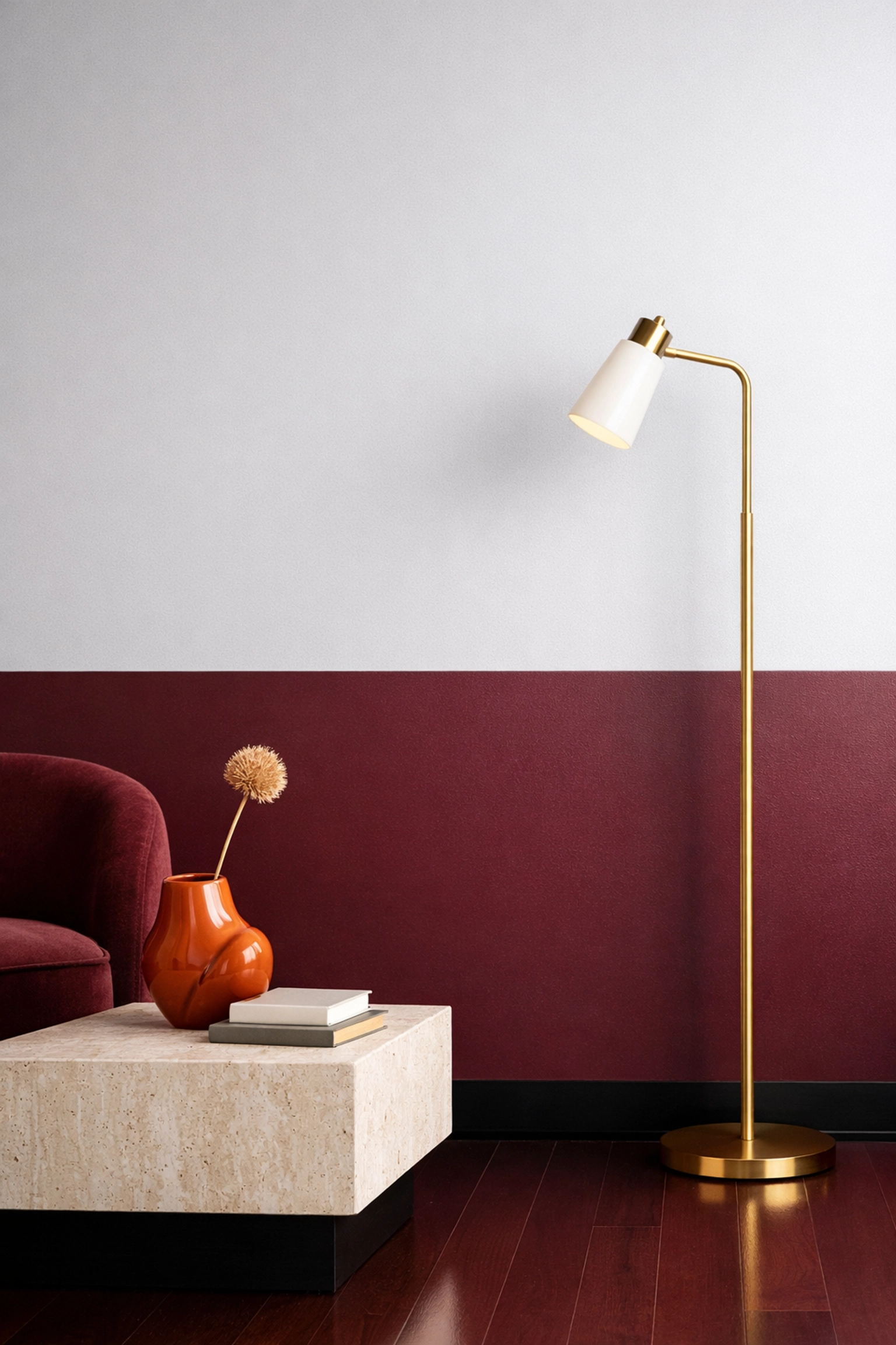 Elegant room corner with a black-cherry and grey two-tone wall, a top 2026 home decor trend.