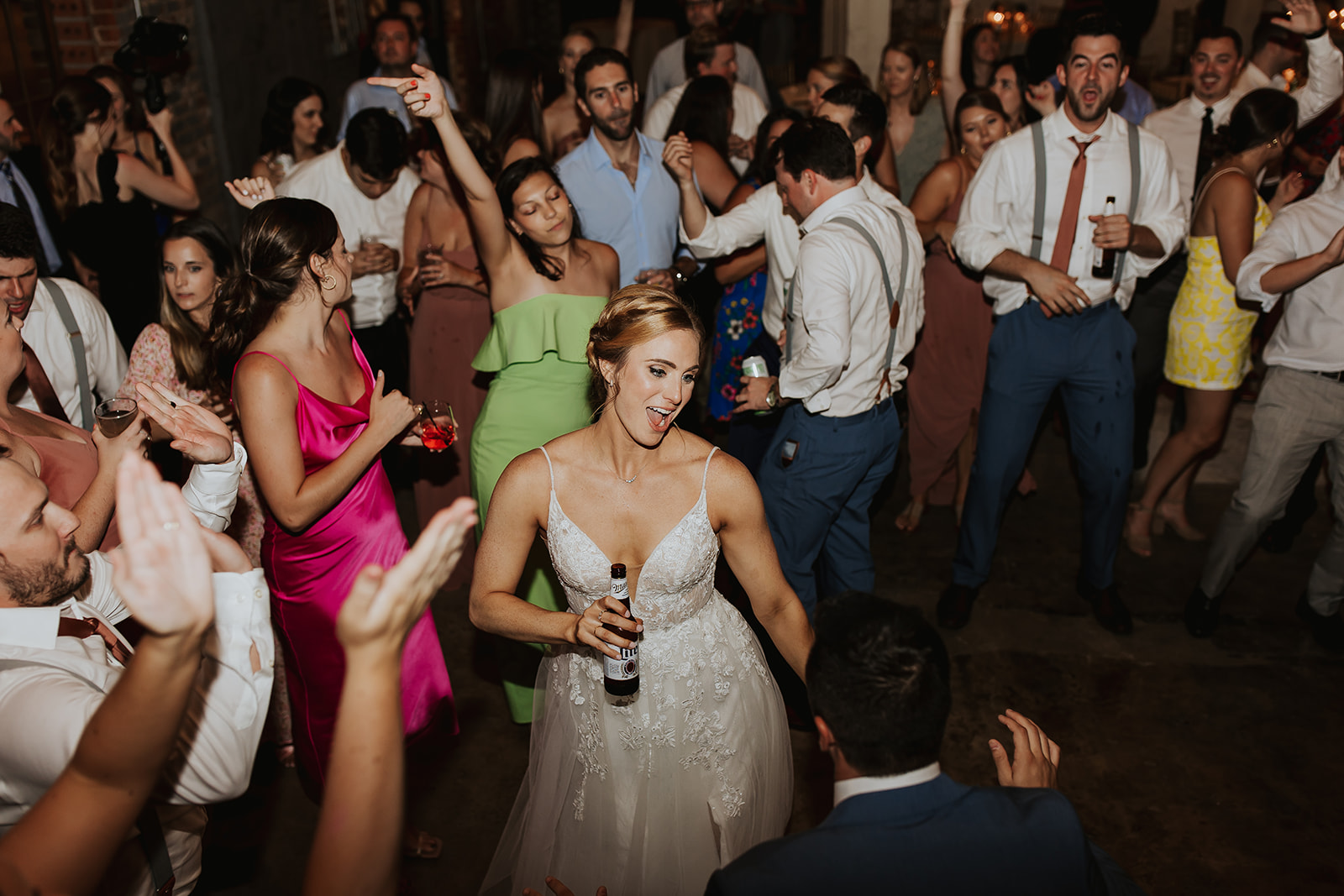 Wedding Dance Reception The bride and wedding guests fill the dance floor