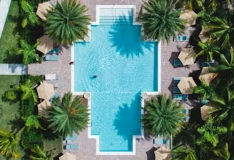 luxury-swimming-pool-aerial-view.webp