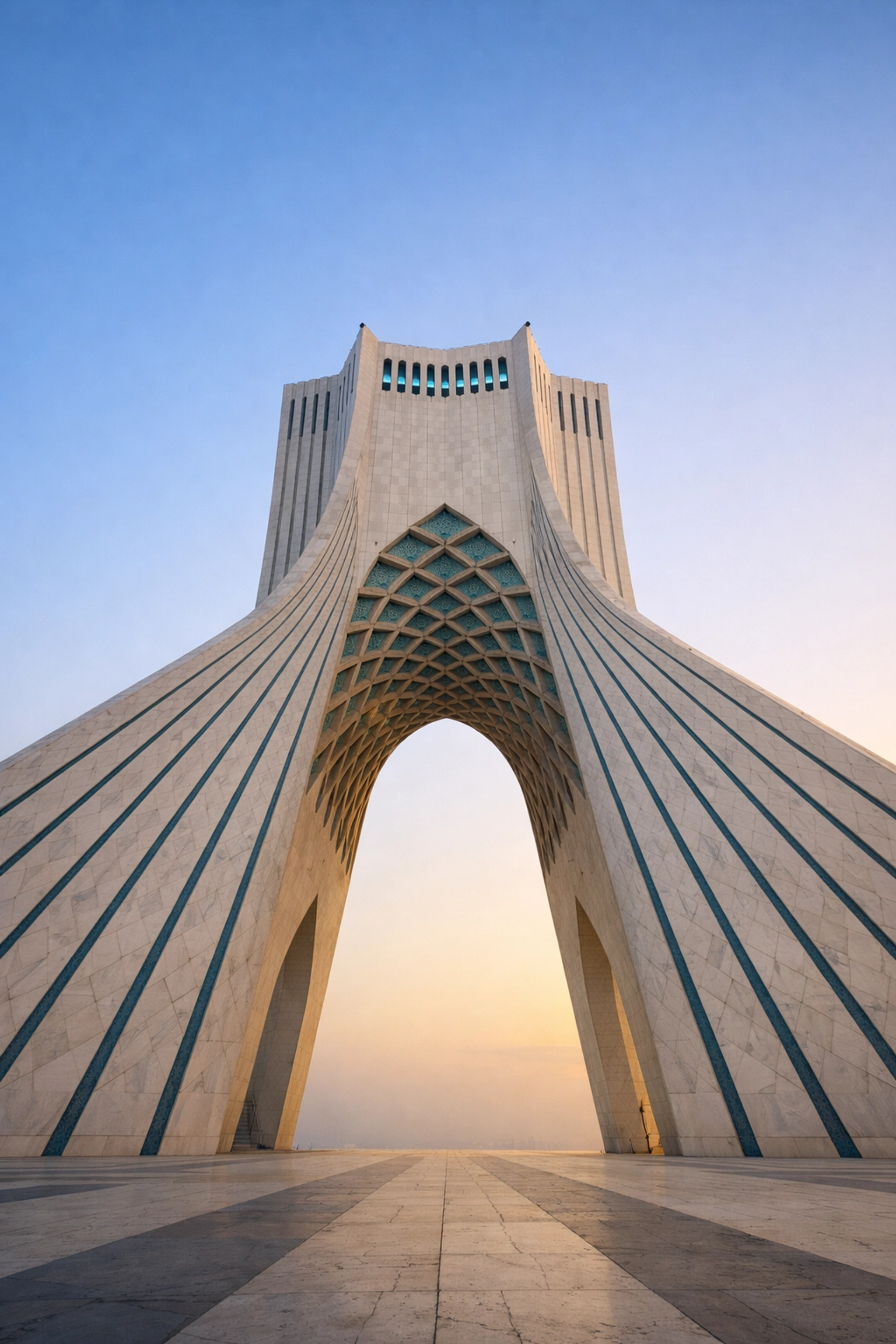 The Azadi Tower in Tehran at dawn, symbolizing Iran's new leadership and historical transition.
