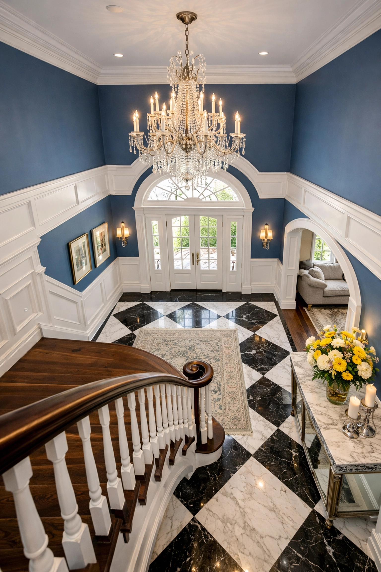 Systematic top-to-bottom house cleaning inside a luxury Shrewsbury home foyer and staircase.