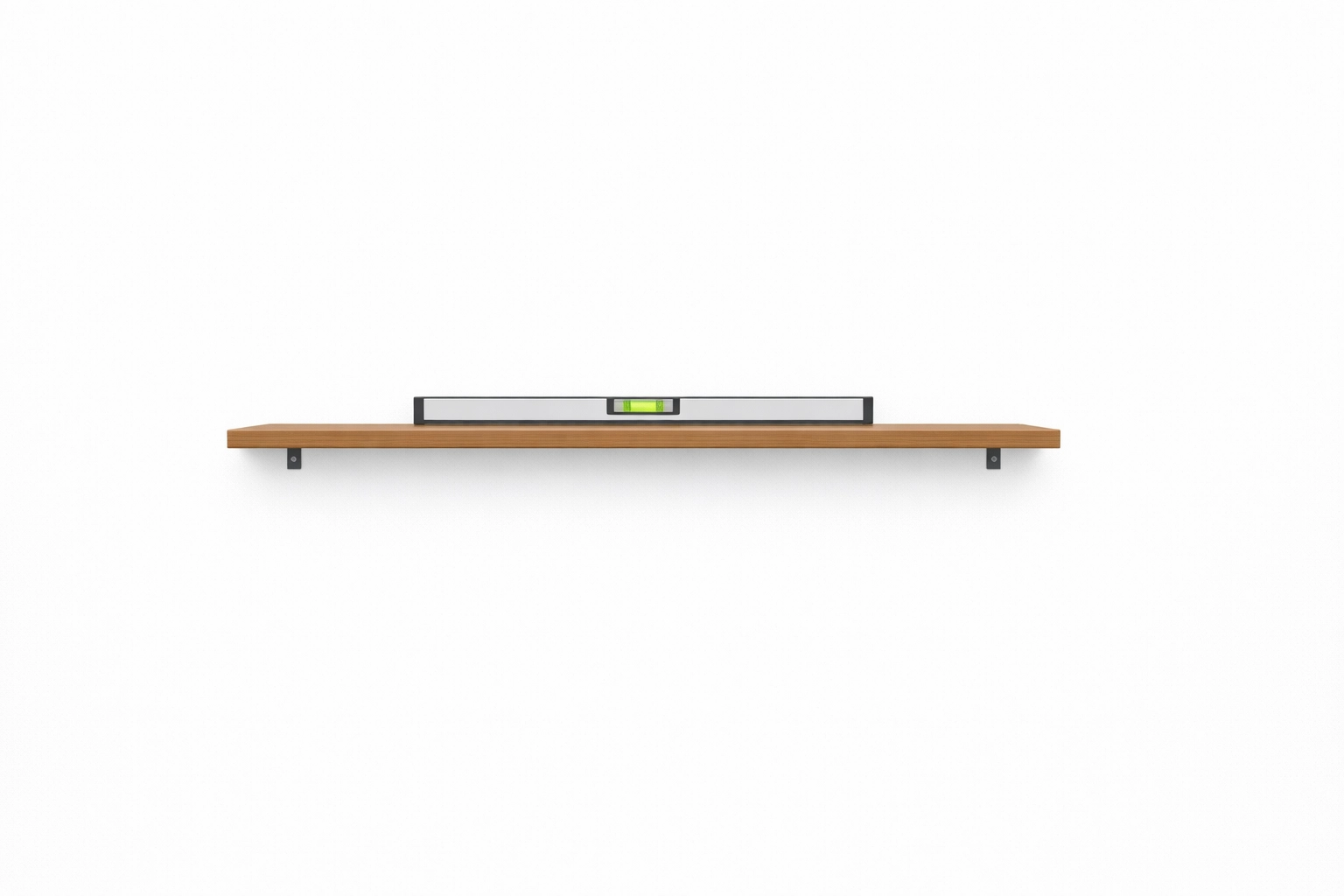 Professional shelving installation in a West End Vancouver condo using a spirit level for perfect balance.