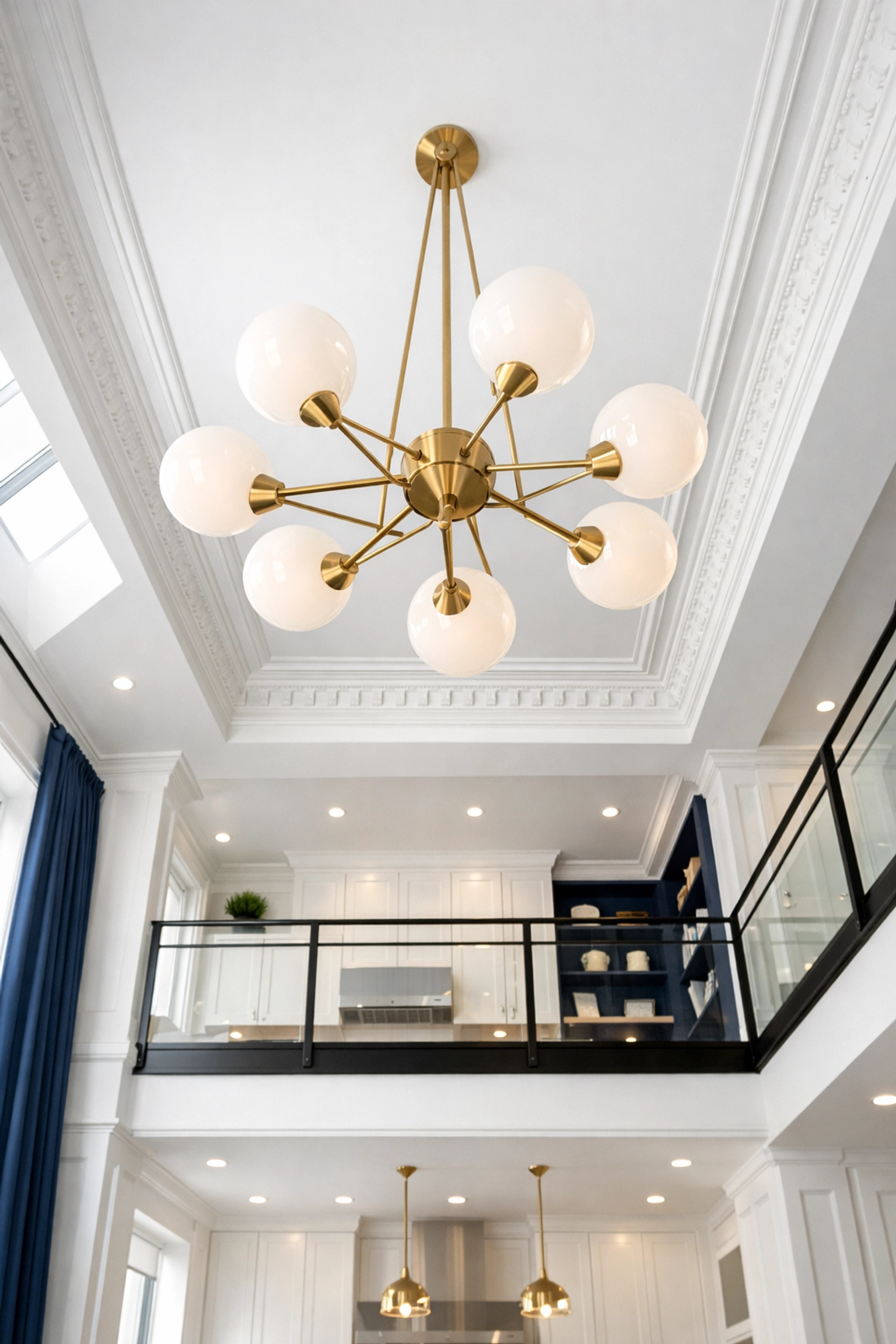 A dust-free Lowell MA loft with clean high ceilings and light fixtures after a top-to-bottom professional cleaning.