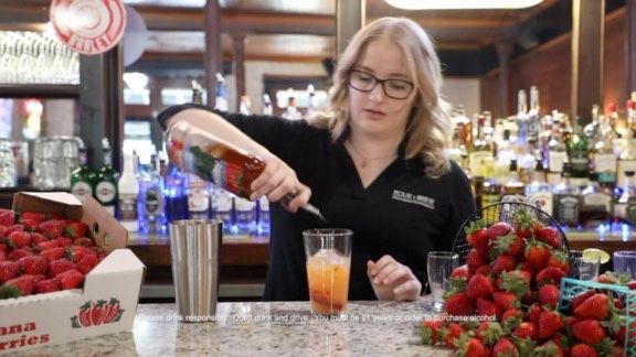 Hardhide Whiskeys lifestyle photo—bartender pouring a cocktail.