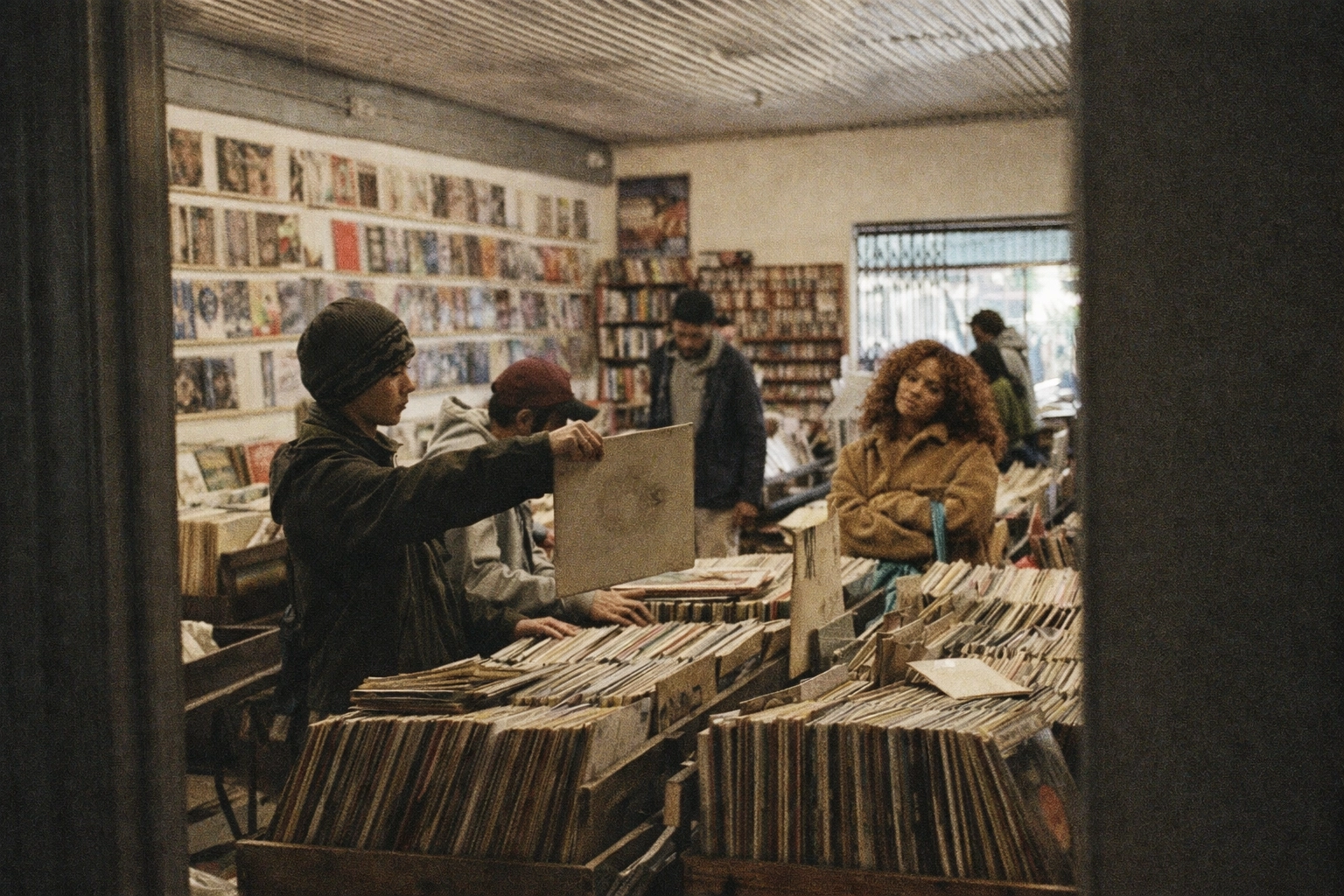 Customers browsing vinyl records at Nivessa