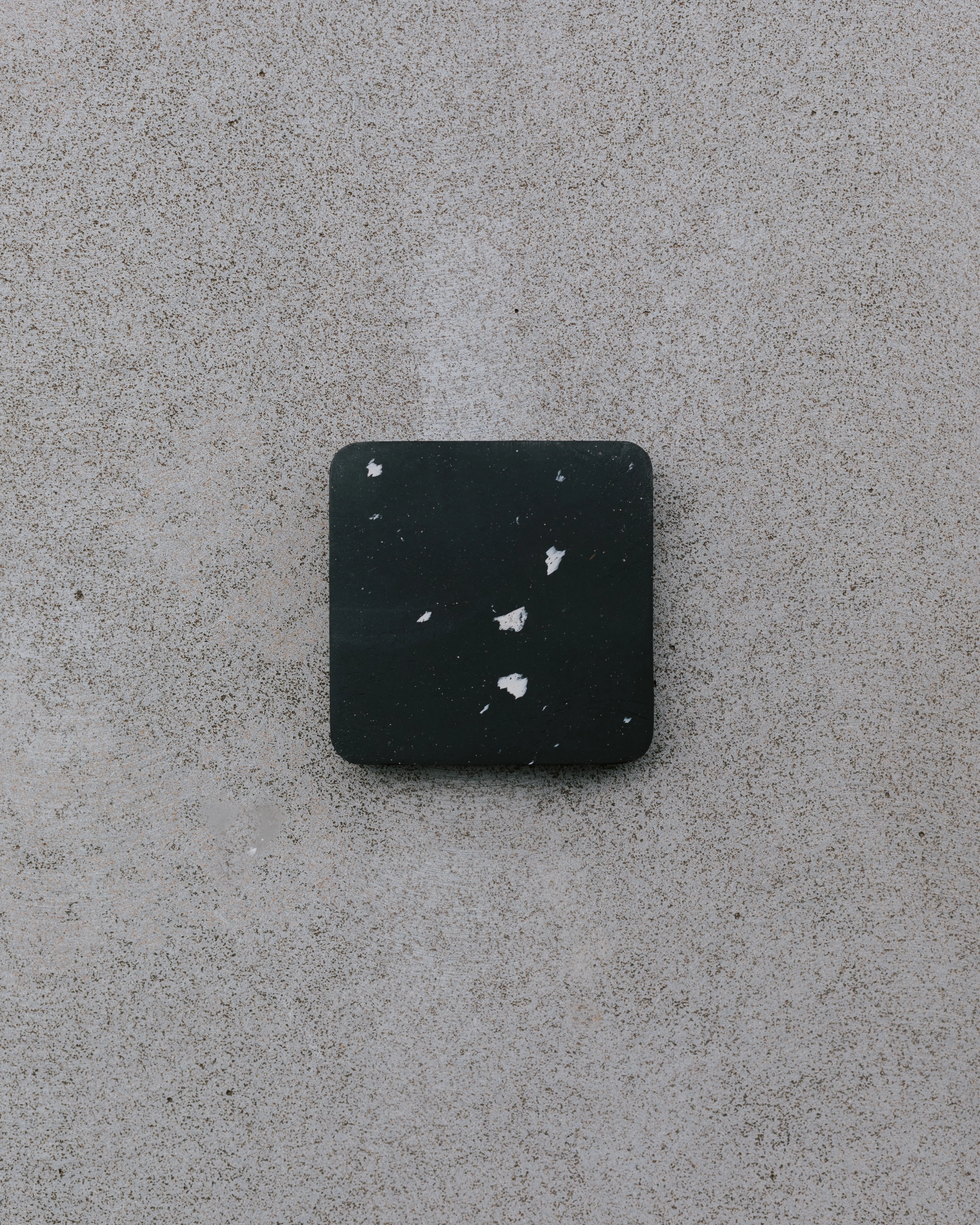 recycled-plastic-panel-square-dark-tone-white-flecks.webp