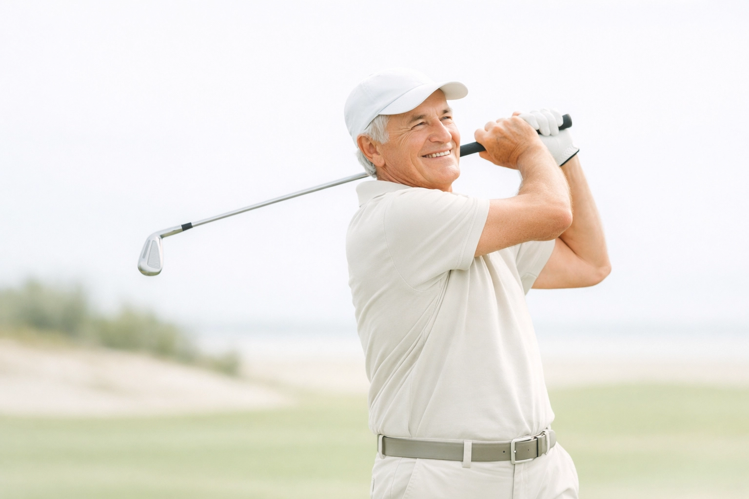 Senior man playing golf, representing positive patient outcomes and trust-building chiropractic marketing results.