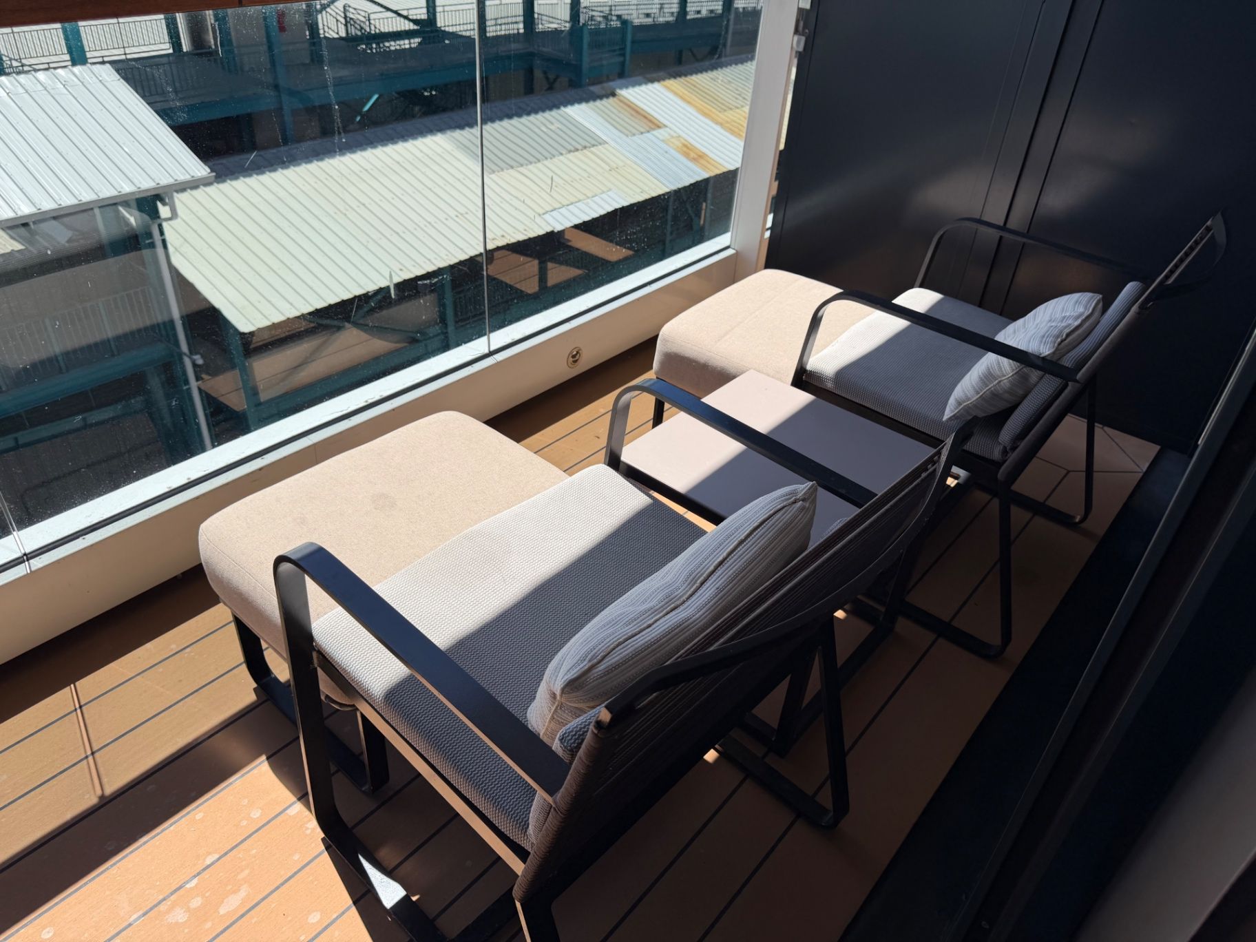 a group of chairs on a balcony