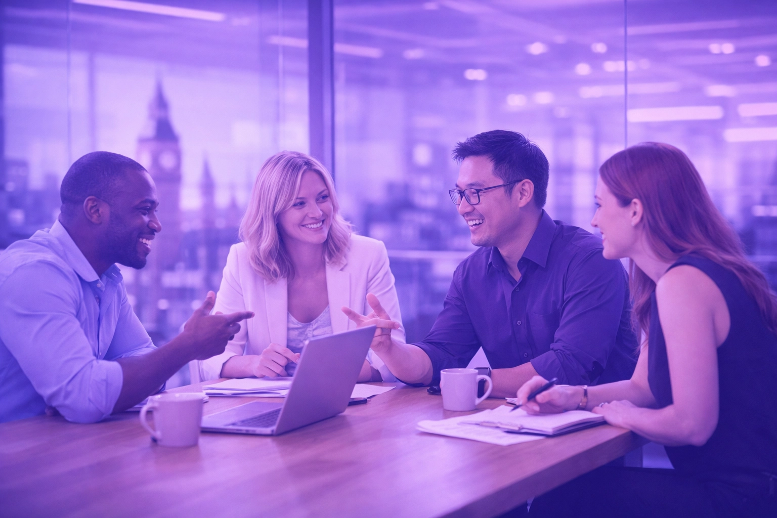 Diverse London team discussing business growth and intelligent workflow automation.