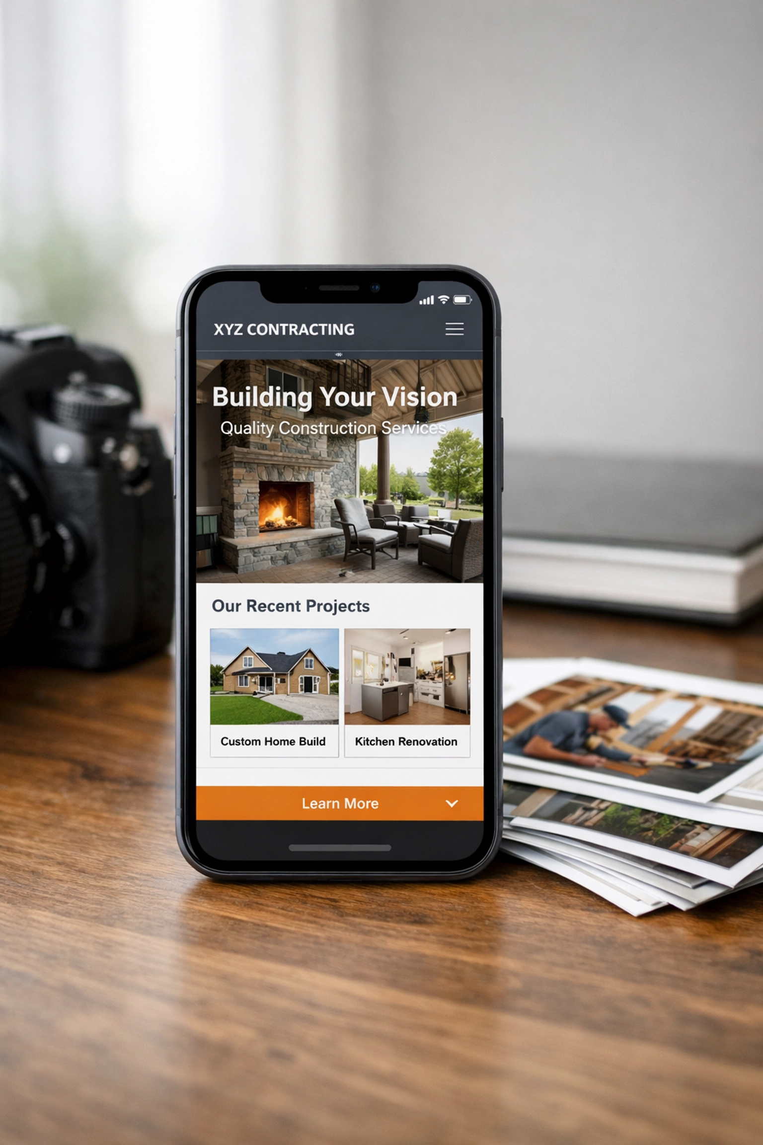 Real business photos and camera on desk showing authentic website content for local businesses