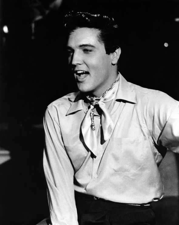 A classic black-and-white portrait capturing the timeless charisma that would eventually emerge from these humble beginnings.