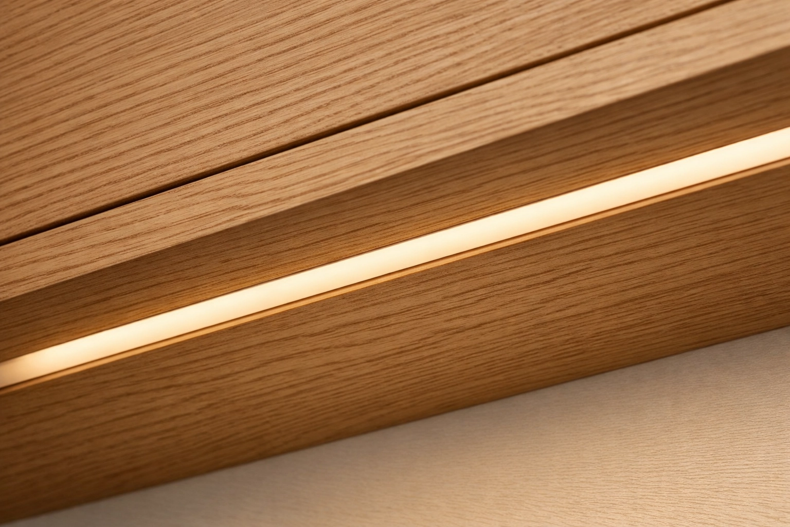 Recessed aluminum LED channel flush-mounted in wood cabinetry for custom, integrated kitchen cabinet lighting.