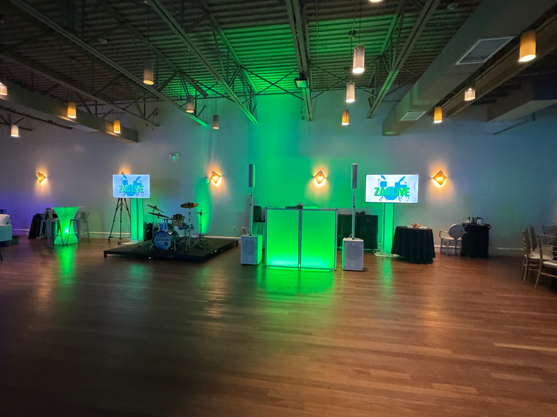 Spacious Event Setup with DJ Booth and Stage