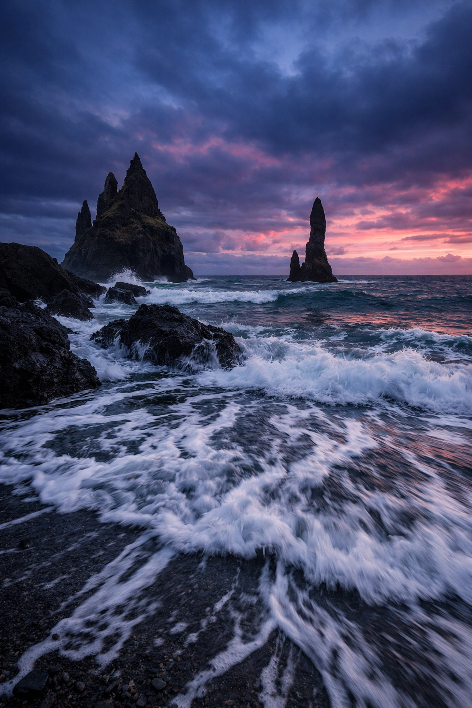 Coastal landscape photography with sea stacks at twilight showcasing effective horizon placement.