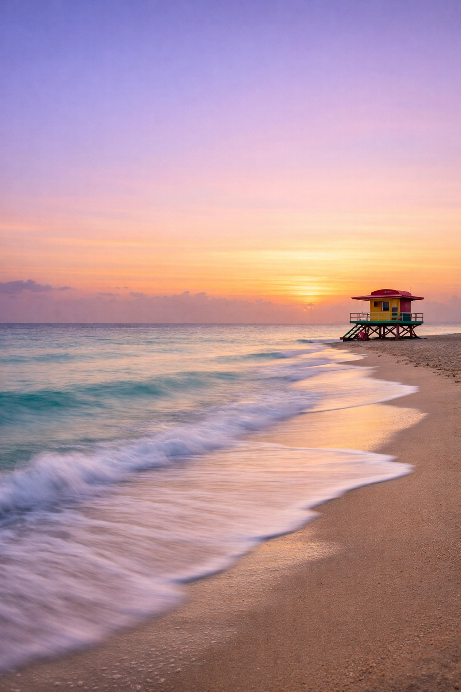 Fine art photography Miami landscape of South Beach at sunrise with the iconic lifeguard tower and ocean.