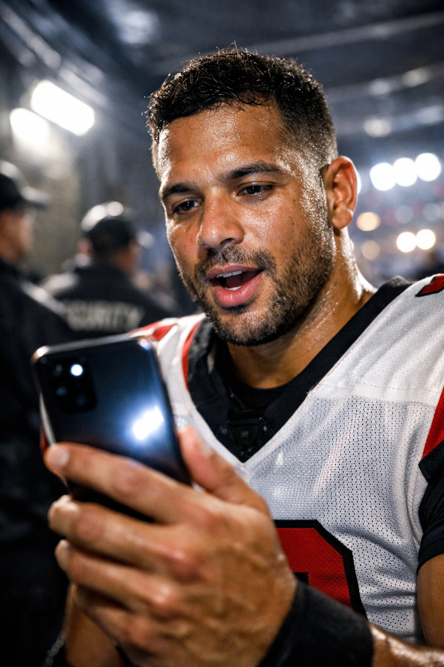 Professional athlete recording authentic behind-the-scenes content for social media fans during the Super Bowl.