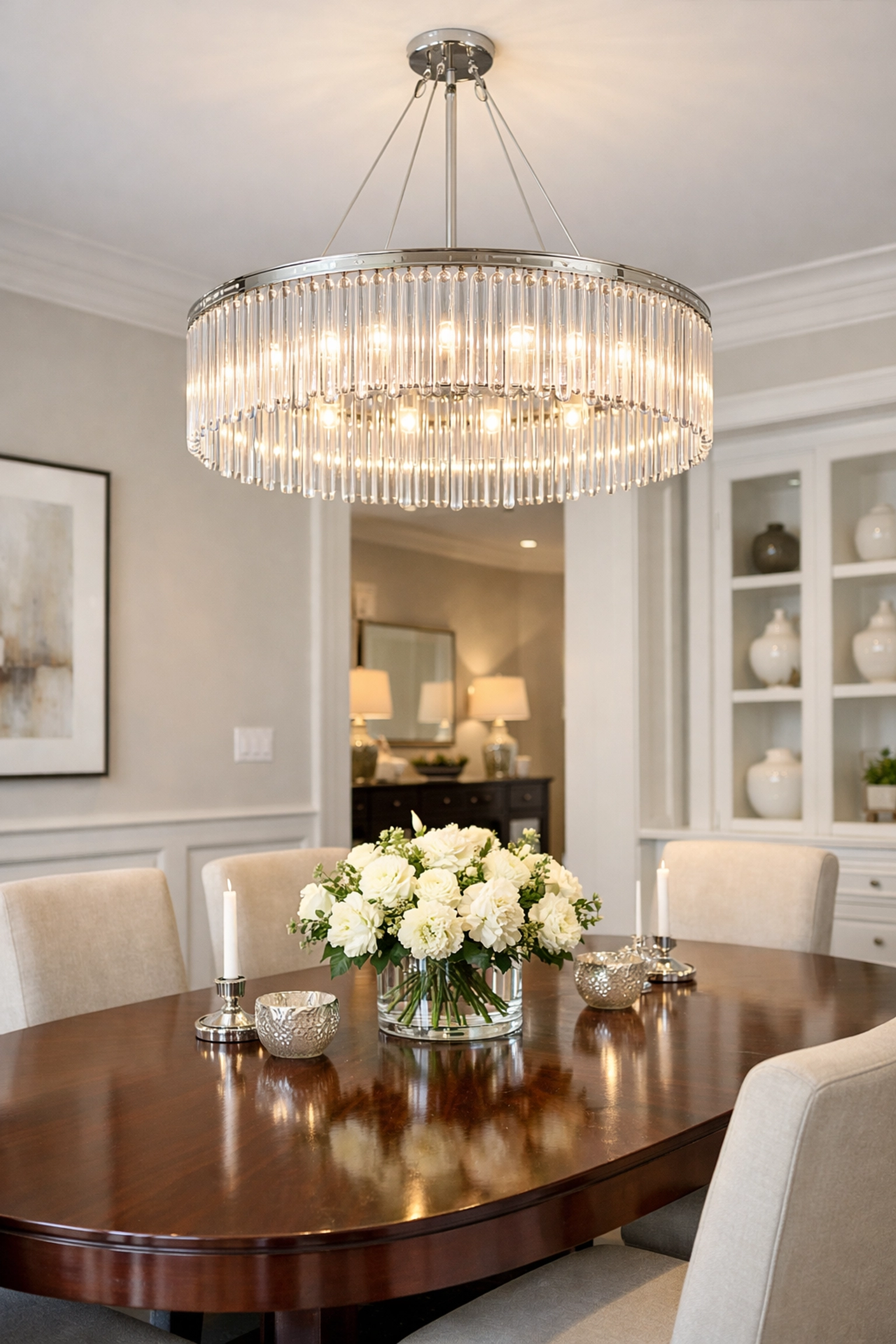 Clean and sparkling modern chandelier in a luxury dining room after professional maintenance.