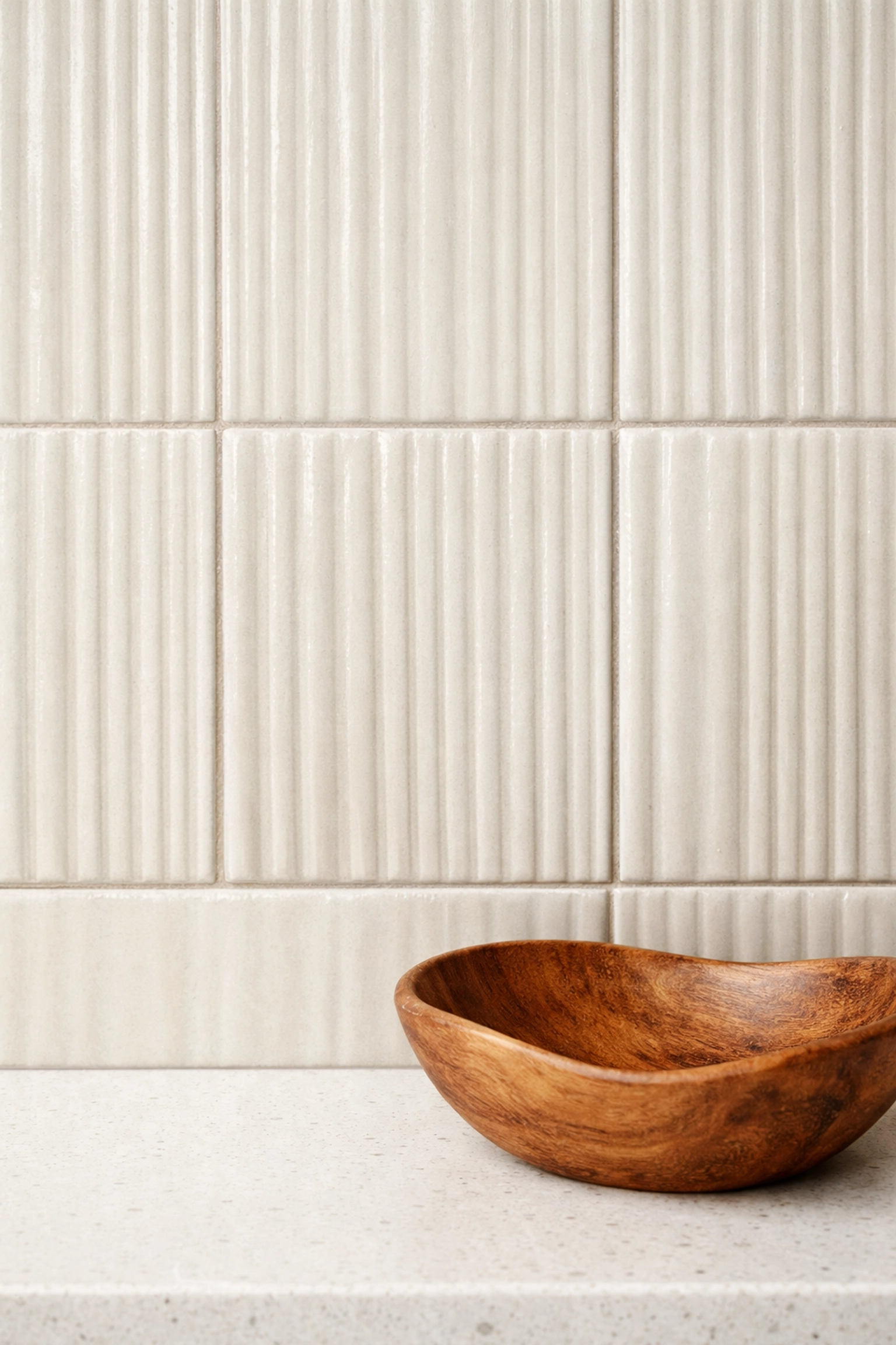 Modern kitchen backsplash featuring high-end ceramic tile installation and professional craftsmanship.