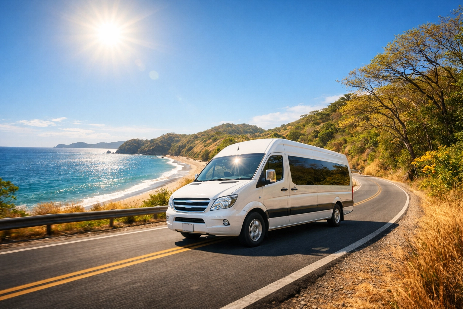 Private Liberia airport transfer van driving along a scenic Guanacaste coastal road by the ocean.