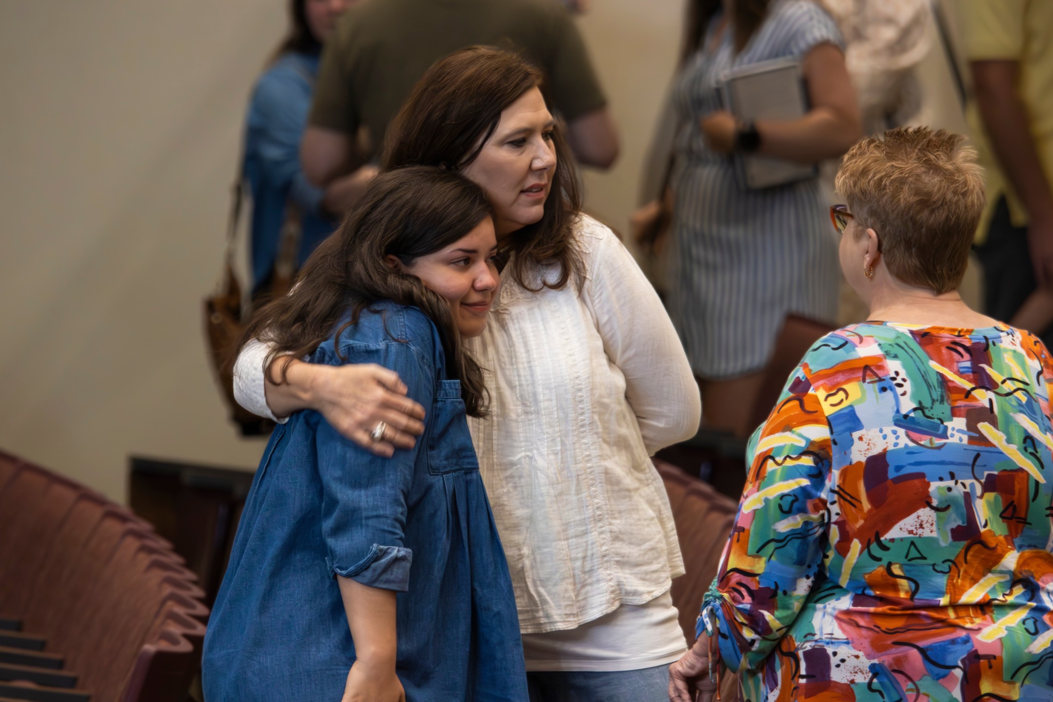 Warm Embrace in Church Sanctuary